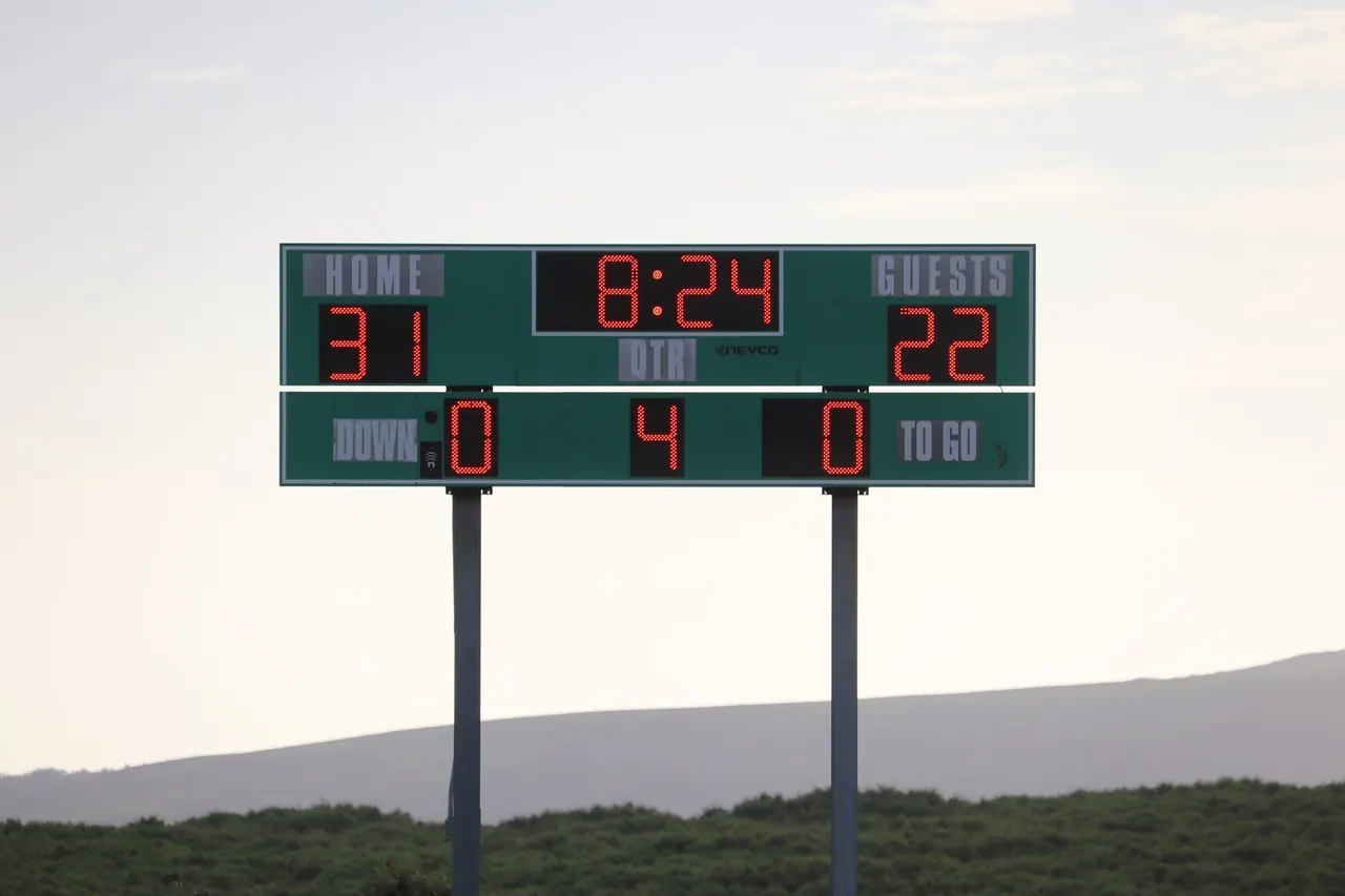 The Molokaʻi High football scoreboard during a game, Home 31 Guests 22